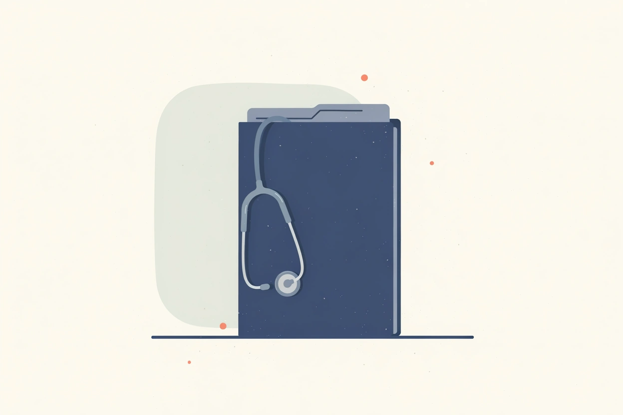A medical records folder with a stethoscope draped over it