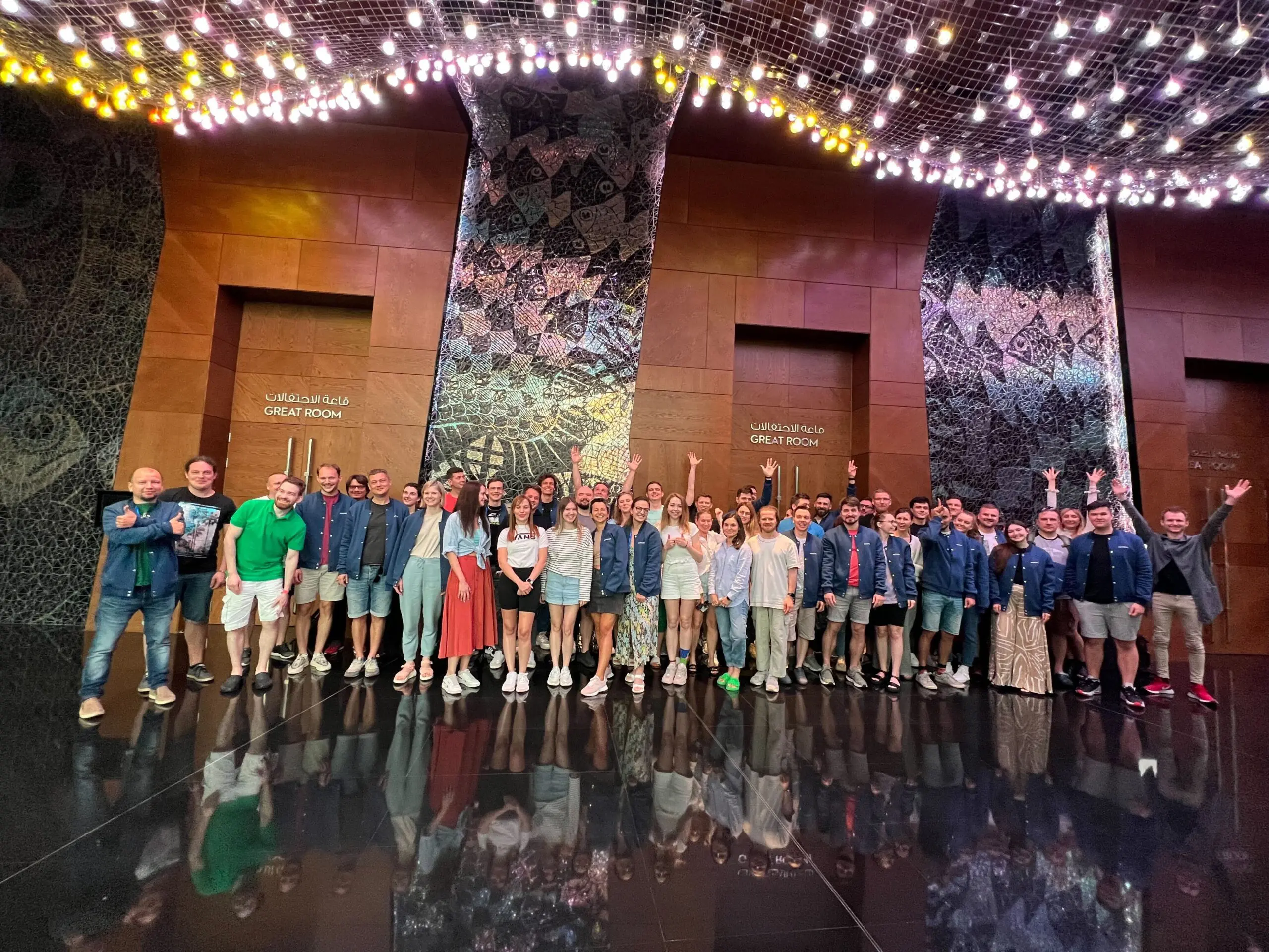 a group photo of Municorn app developer company taken at a corporate event in Oman